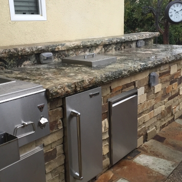 Built in BBQ with Fridge, Stacked Stone and Granite