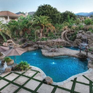 Tropical Rock Swimming Pool with Slide and Waterfalls