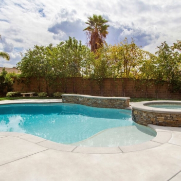 Freeform Pool with Raised Stone Spa