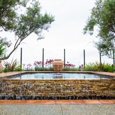 Traditional Spa with Ledger Stone Spillway