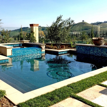 Traditional Swimming Pool with Glass Tile Accents
