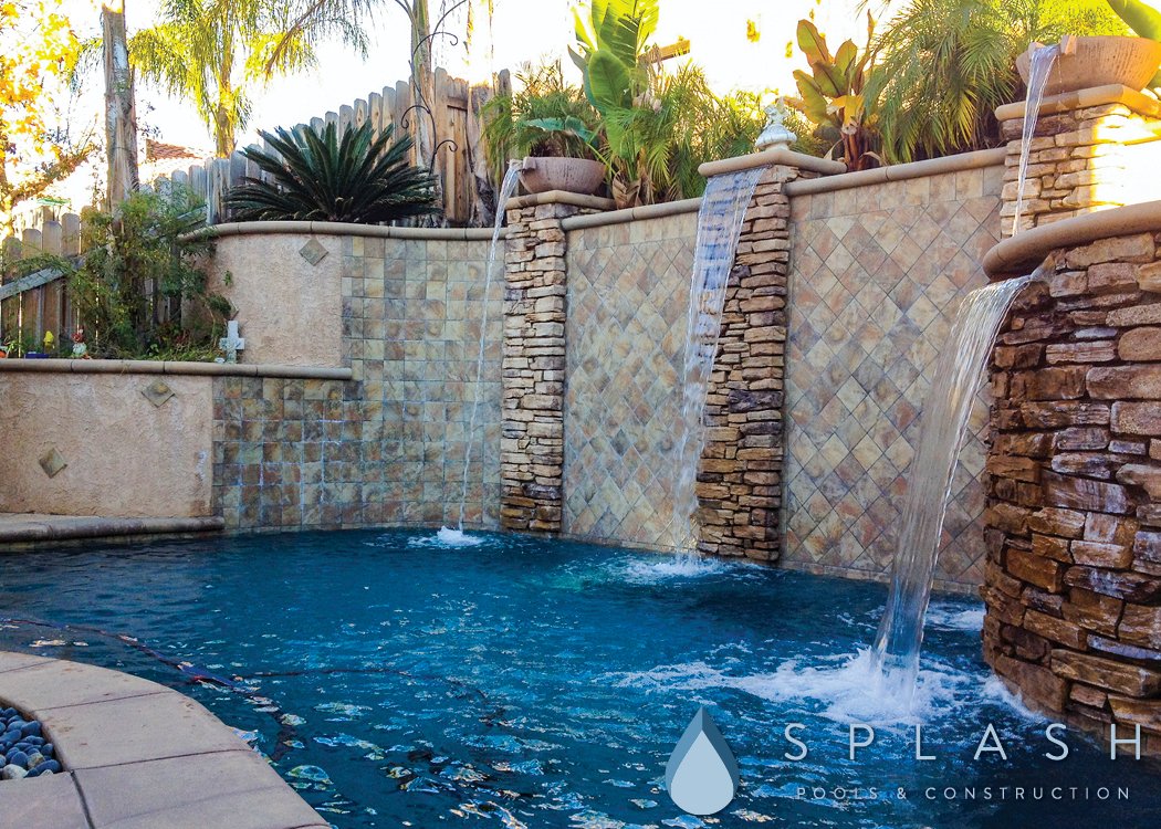 Swimming Pool in a Sloped Yard - Splash Pools & Construction, Inc.